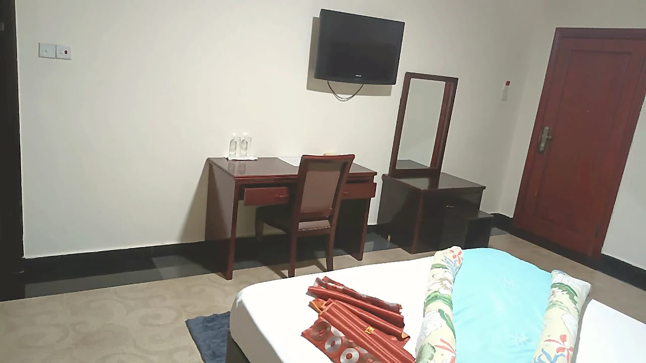Room work desk and vanity area at Grand Favor Hotel